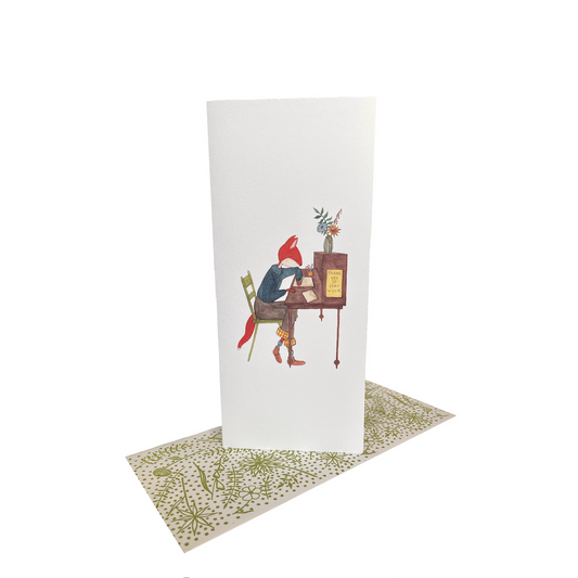 Card with illustration of a gnome playing piano on a computer screen