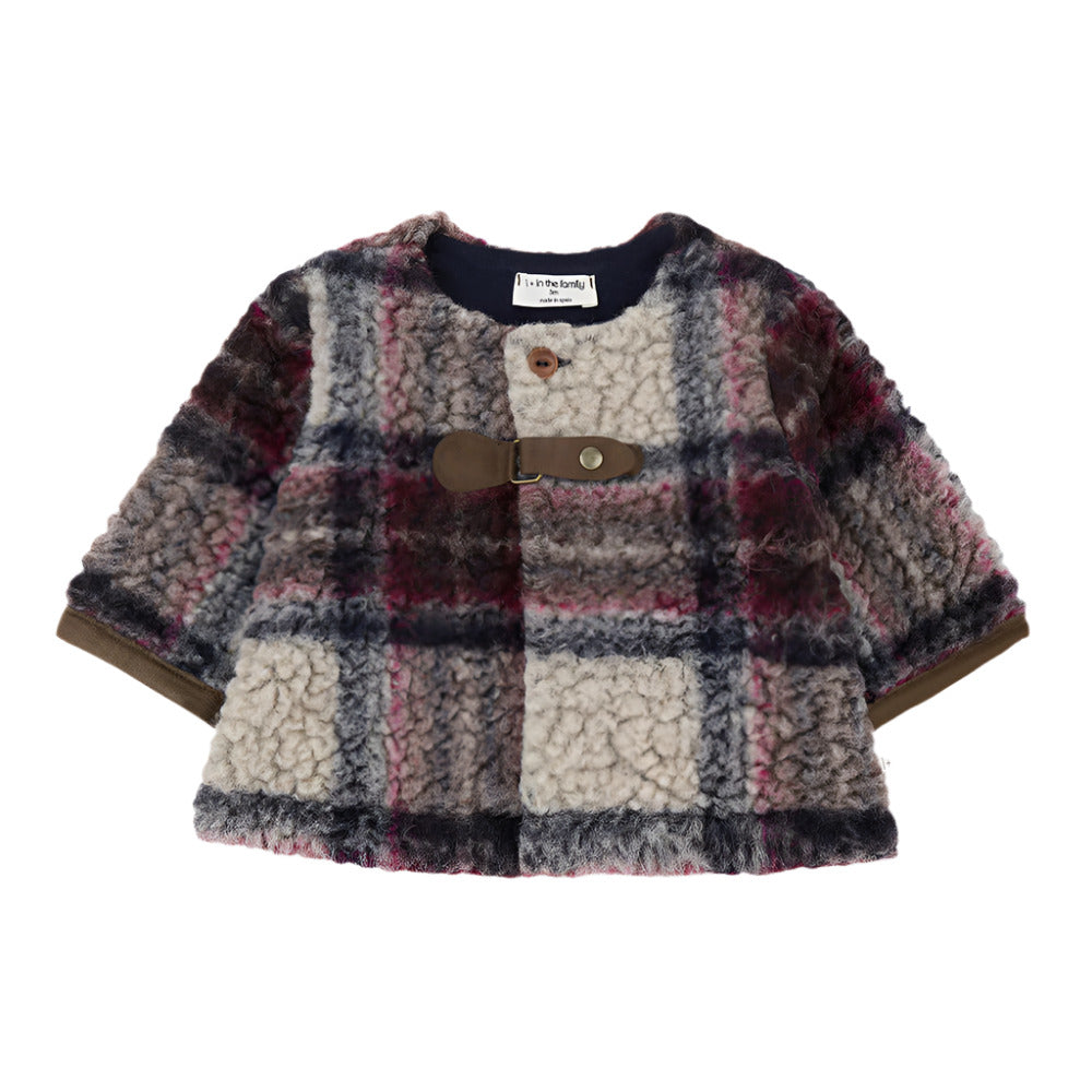 Plaid patterned jacket with a belt on a white background