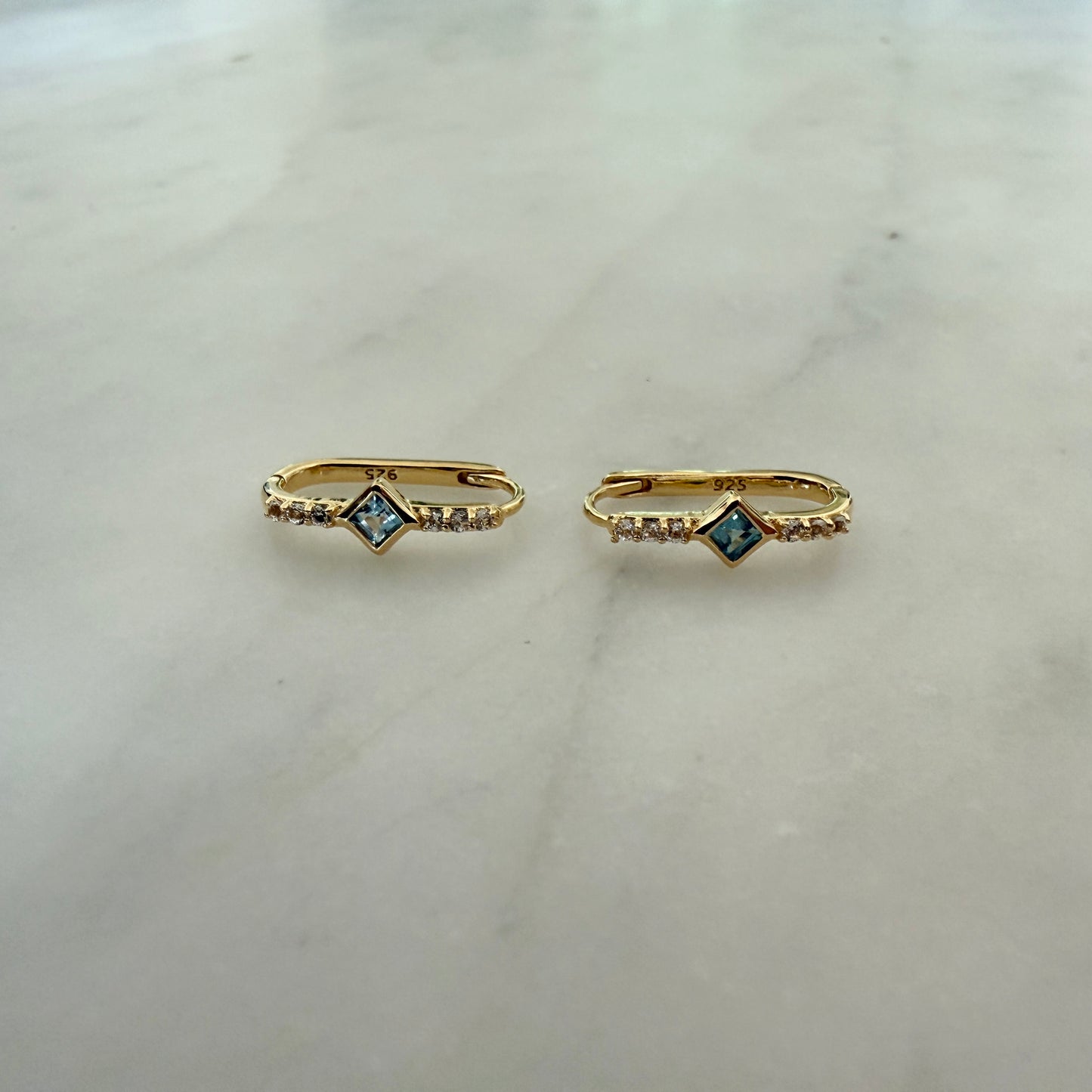 BLUE TOPAZ & WHITE QUARTZ HUGGIE HOOPS
