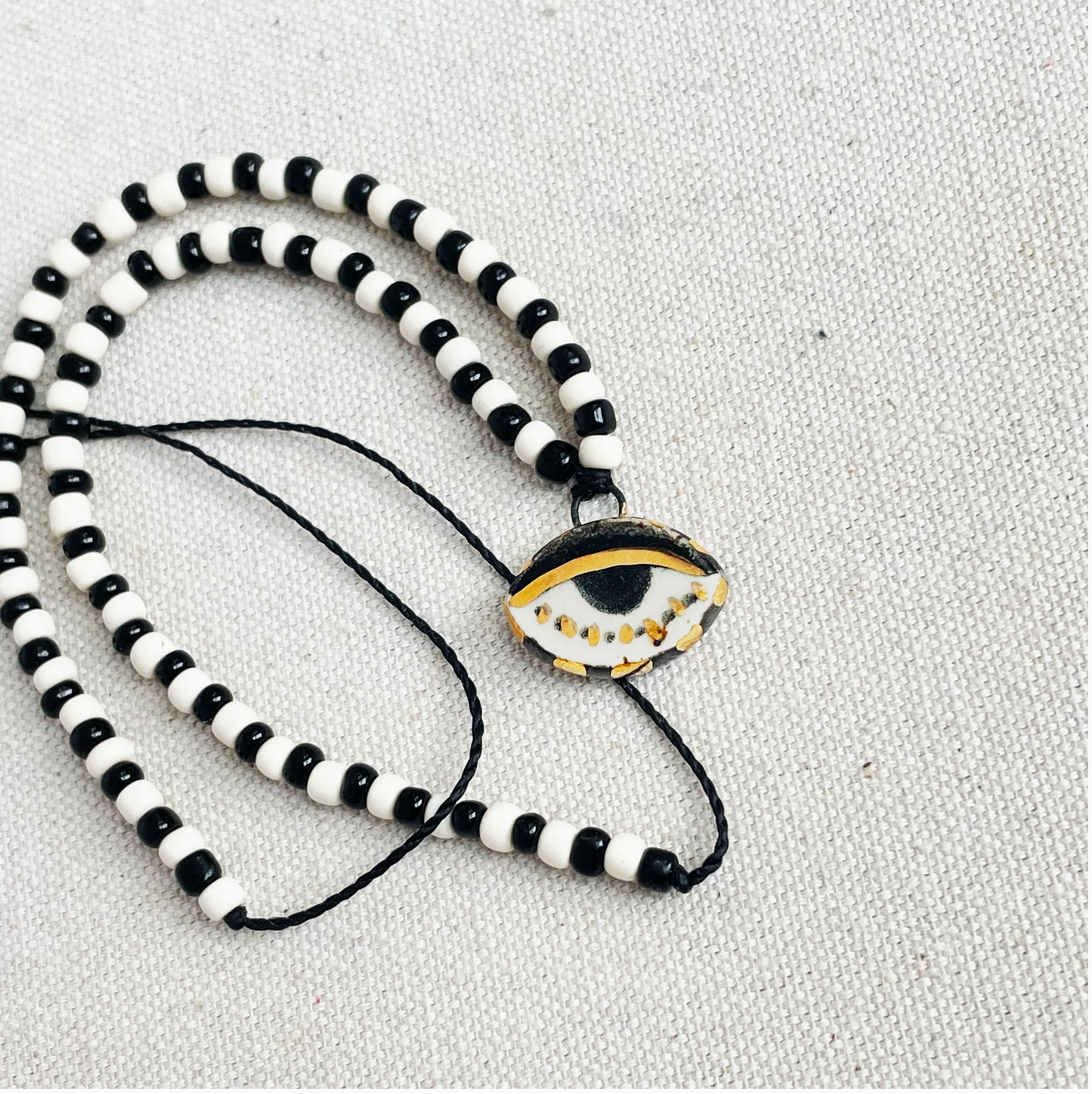 NOT SO EVIL BEAD NECKLACE