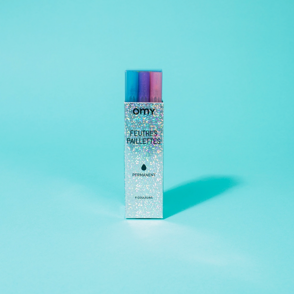 Omy Feuers Palette makeup product on a light blue background