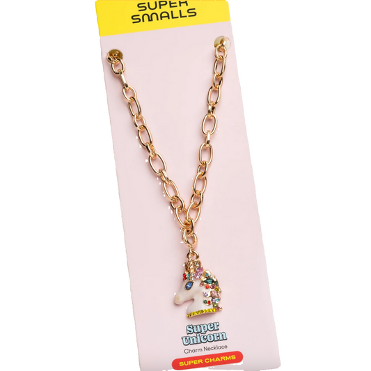 Gold chain necklace with a unicorn charm on a pink card labeled 'Super Smalls'.