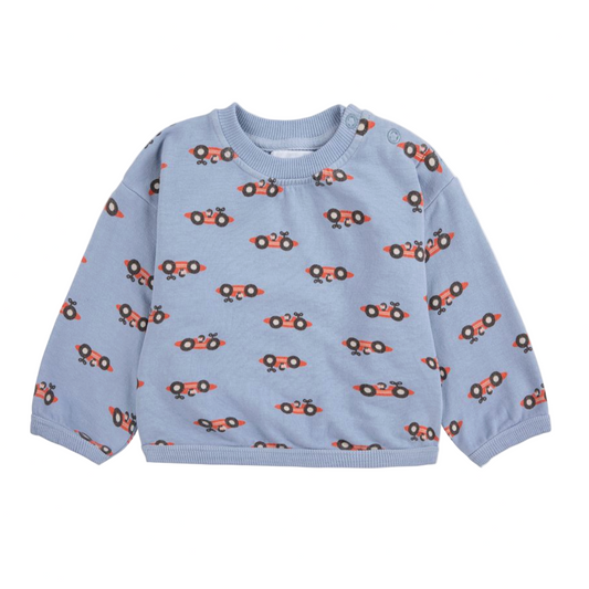 Light blue sweatshirt with car pattern on a white background