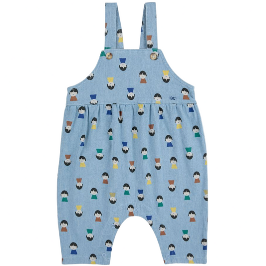 Blue children's overalls with a pattern of small figures on a white background