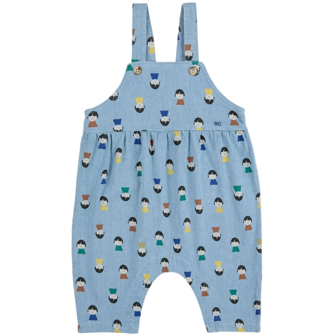 Blue children's overalls with a pattern of small figures on a white background