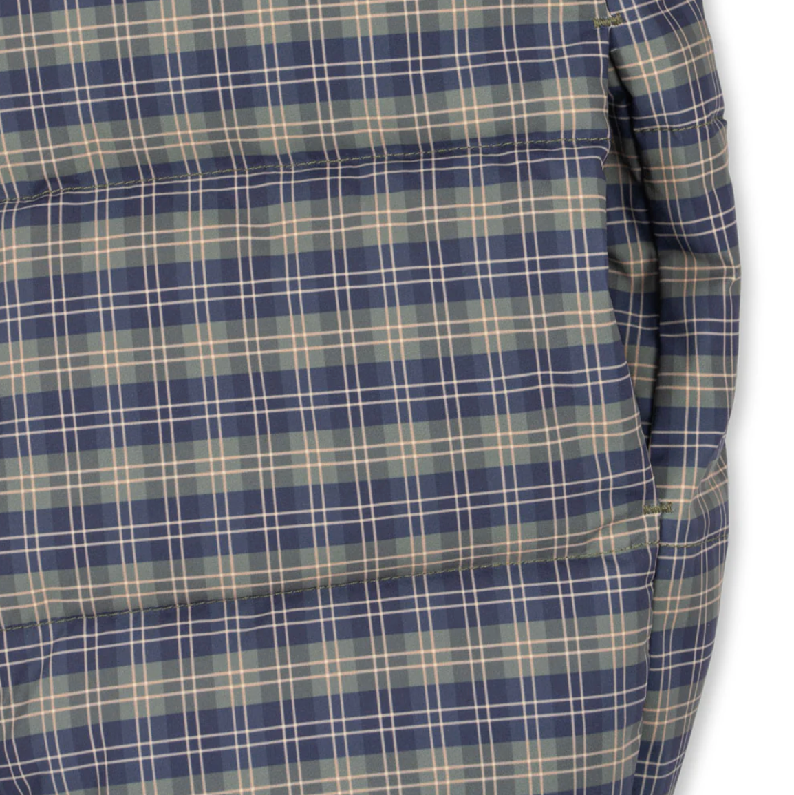 Plaid shirt with blue and beige pattern on a white background