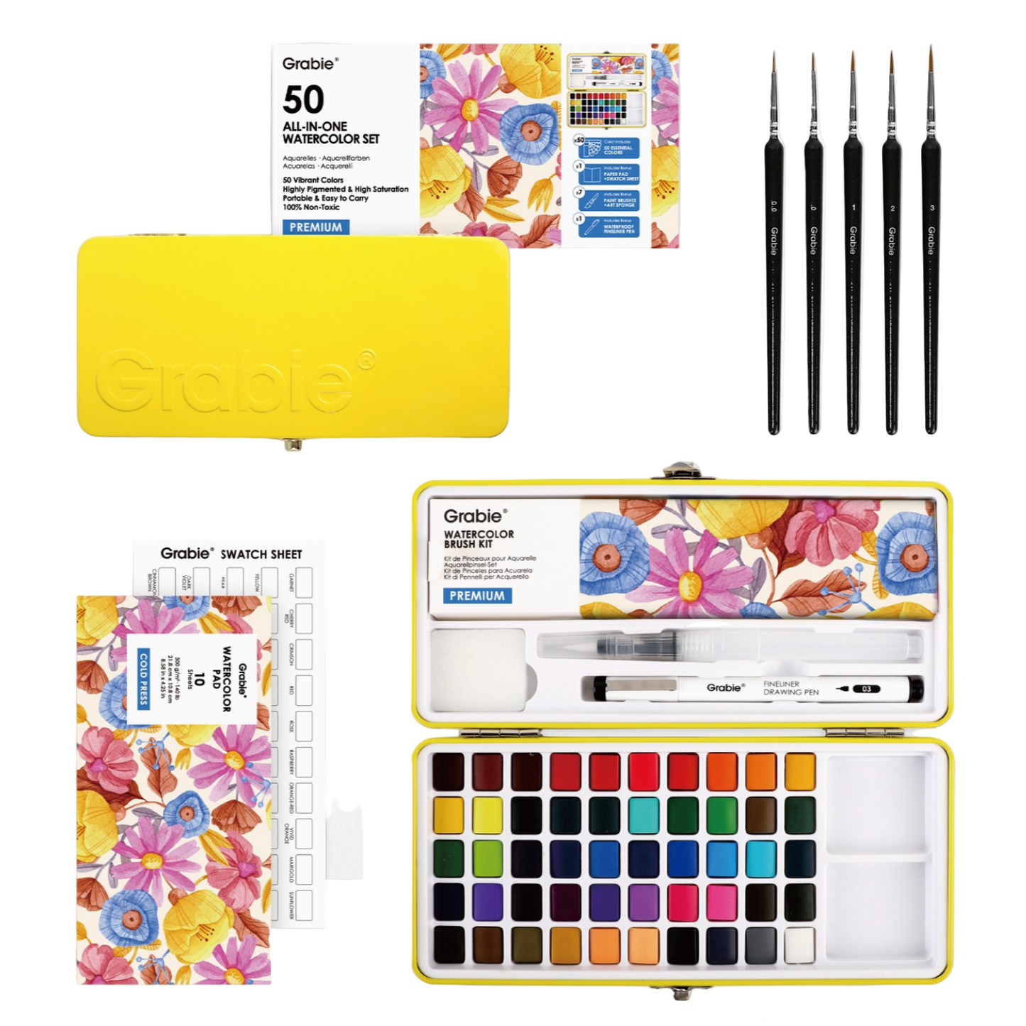 Art supply set with watercolor paints, brushes, and swatch sheets on a white background