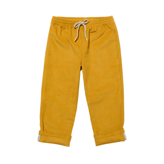 Mustard yellow sweatpants with a drawstring on a white background