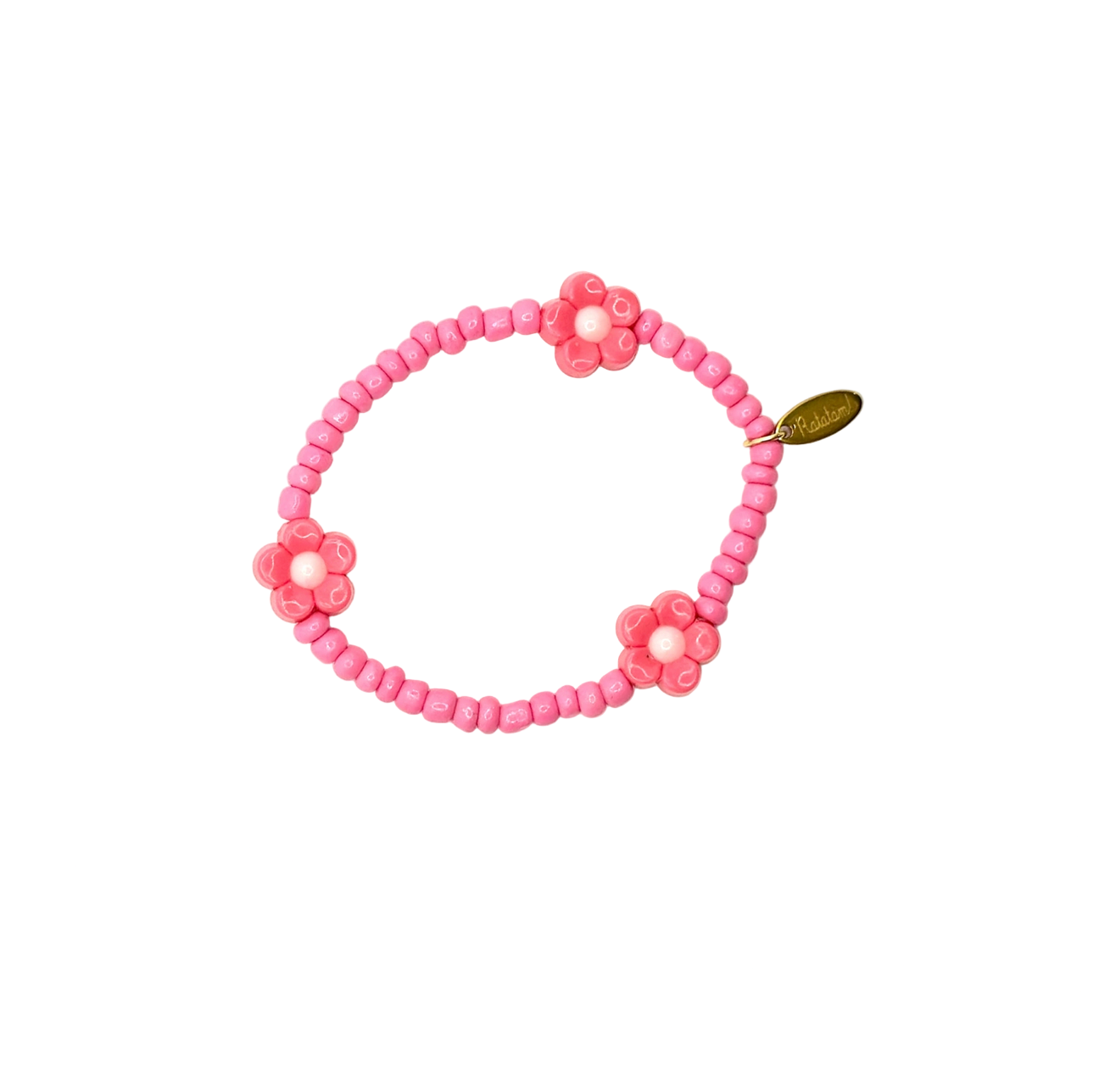 Pink beaded bracelet with floral ends on a white background