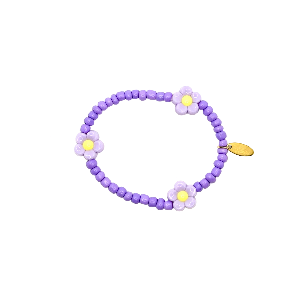 Purple beaded bracelet with flower charms on a white background
