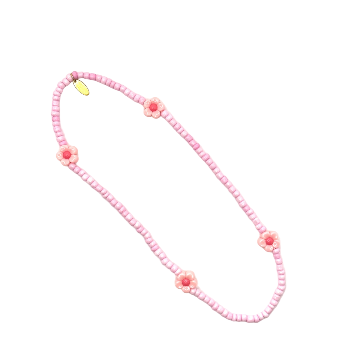 Pink beaded necklace with floral designs on a white background
