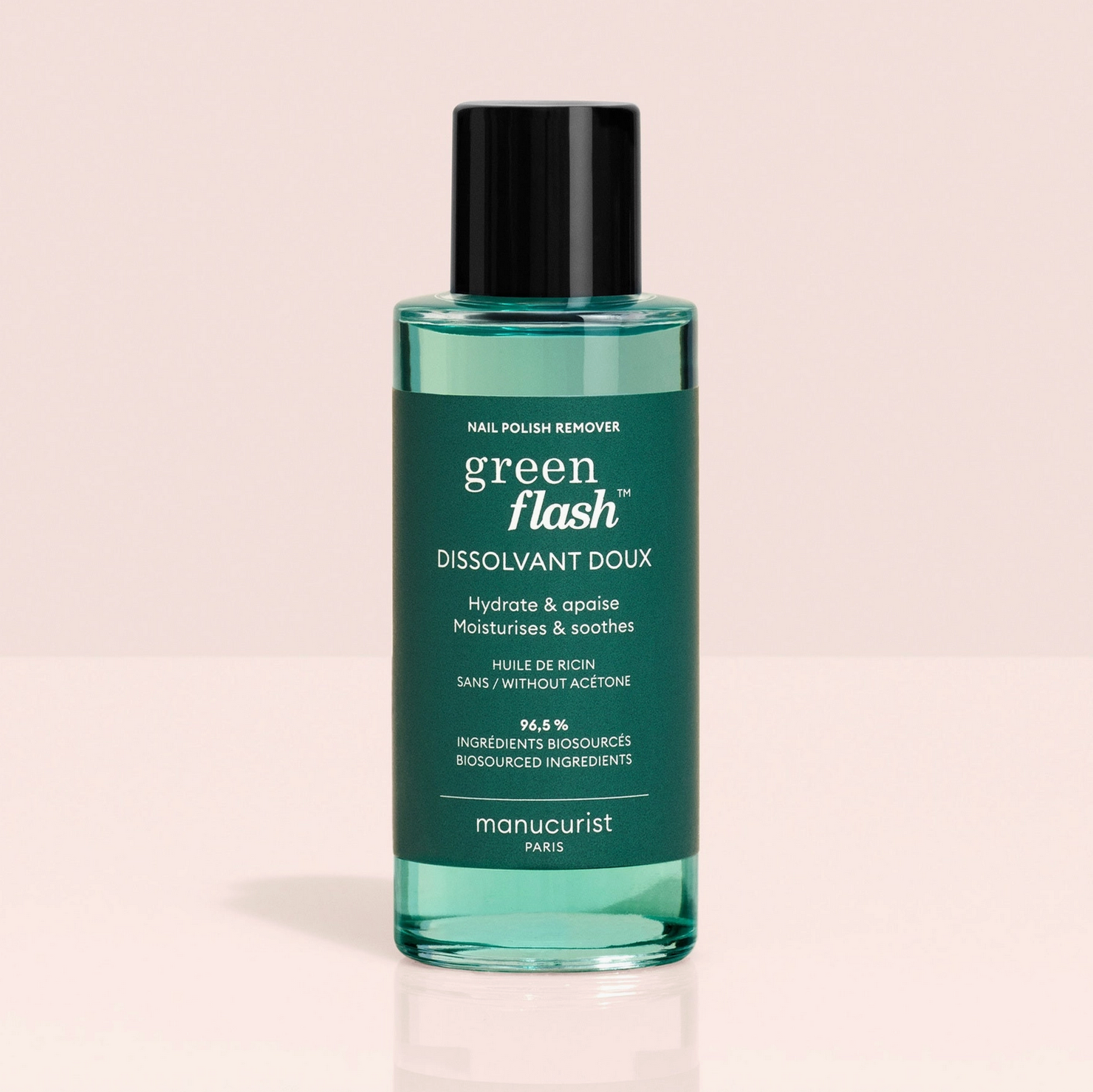 Green Flash nail polish remover bottle on a beige background