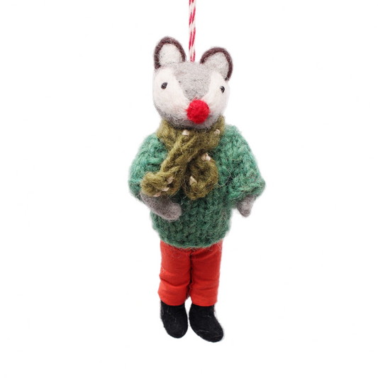 Plush mouse ornament wearing a green sweater and red pants on a white background