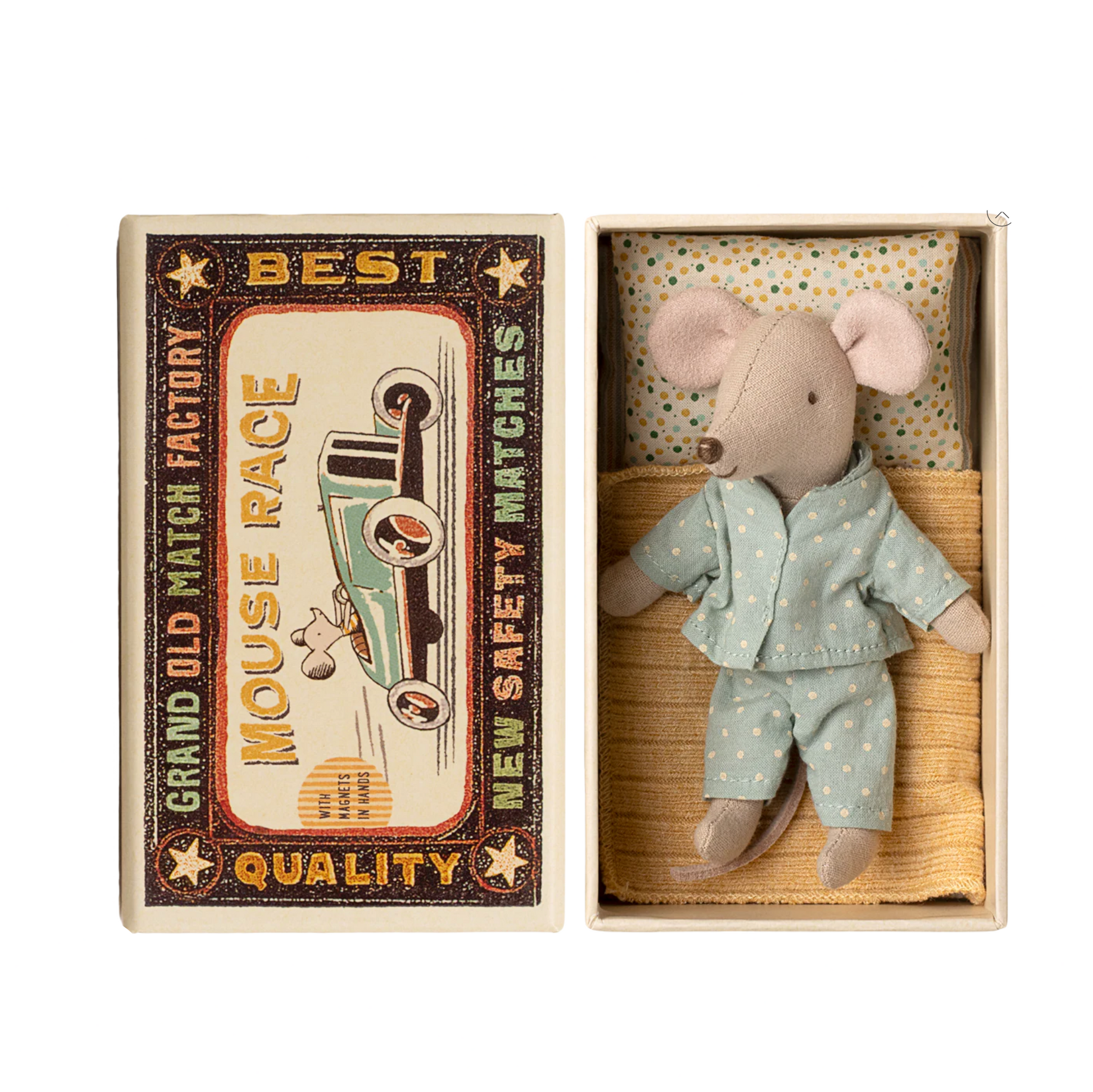 Stuffed mouse toy in a matchbox with a decorative label on a computer screen.