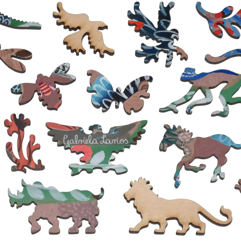 Collection of colorful animal figurines on a white background