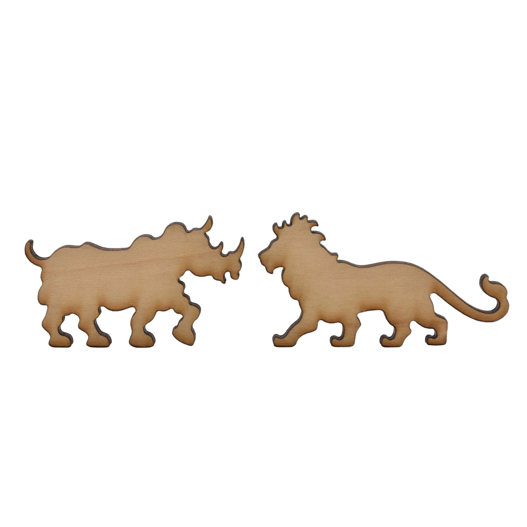 Wooden cutout shapes of a rhino and a lion on a white background