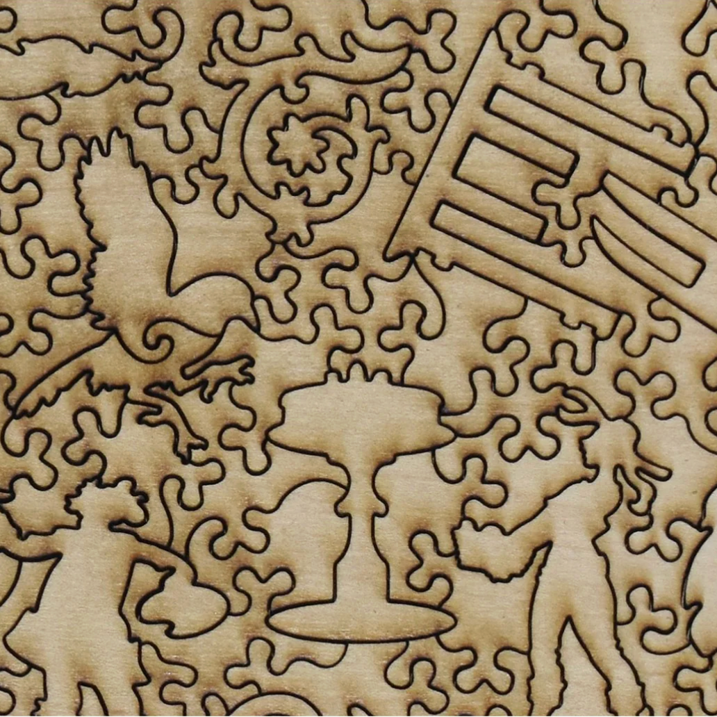 Wooden puzzle with laser-cut pieces featuring abstract designs and symbols.