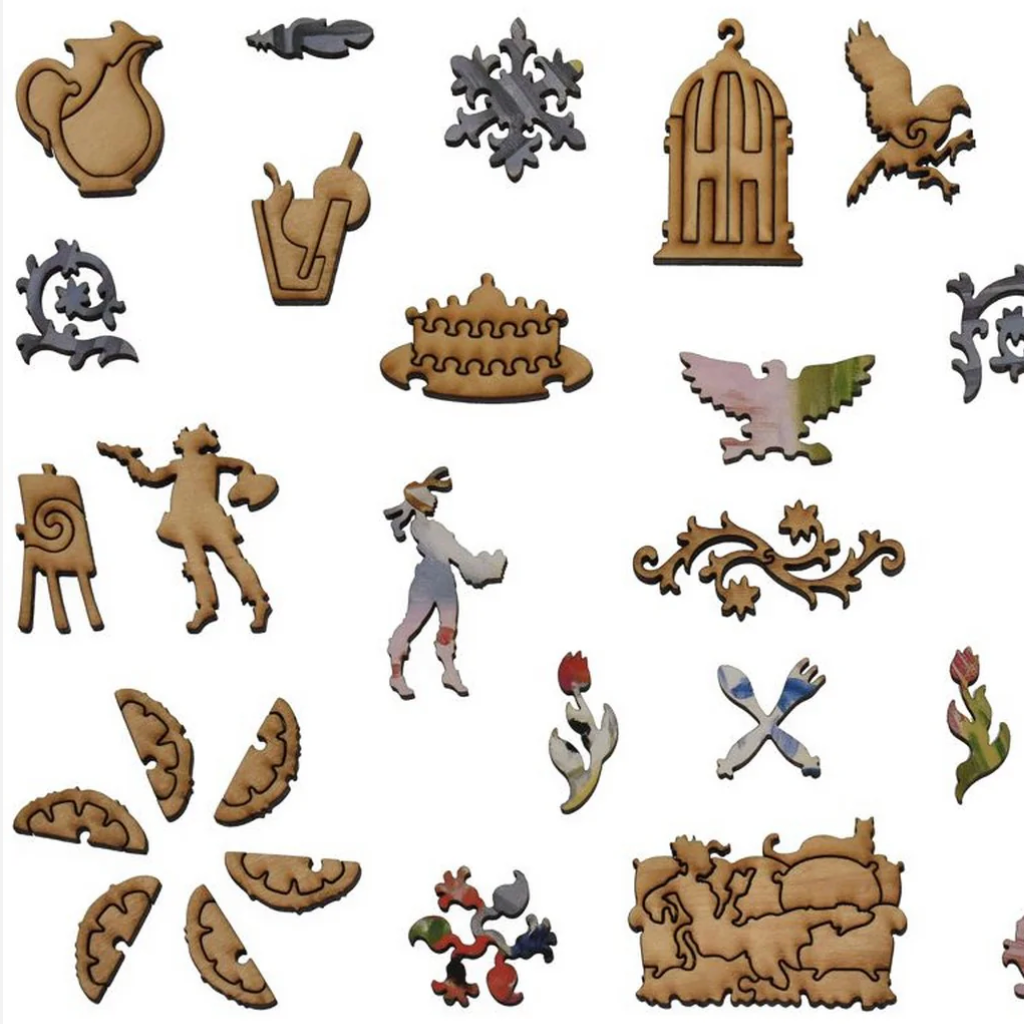 Collection of various decorative wooden cutouts on a white background
