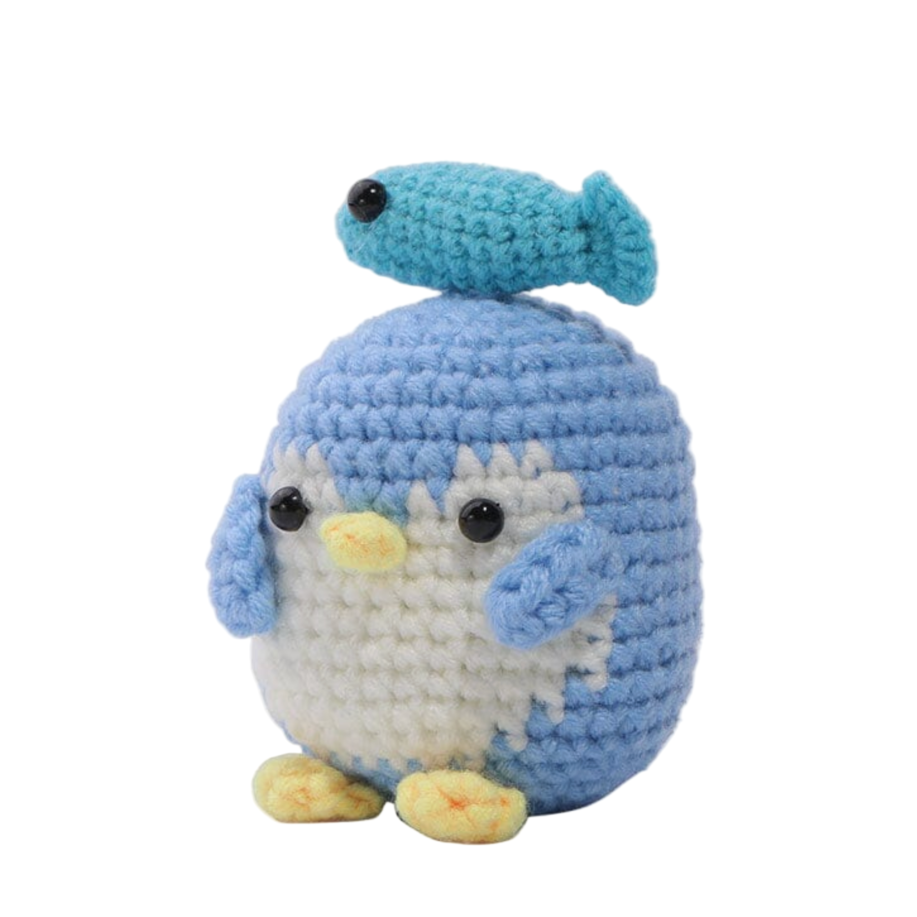 Crocheted penguin toy with blue and white colors on a computer screen.