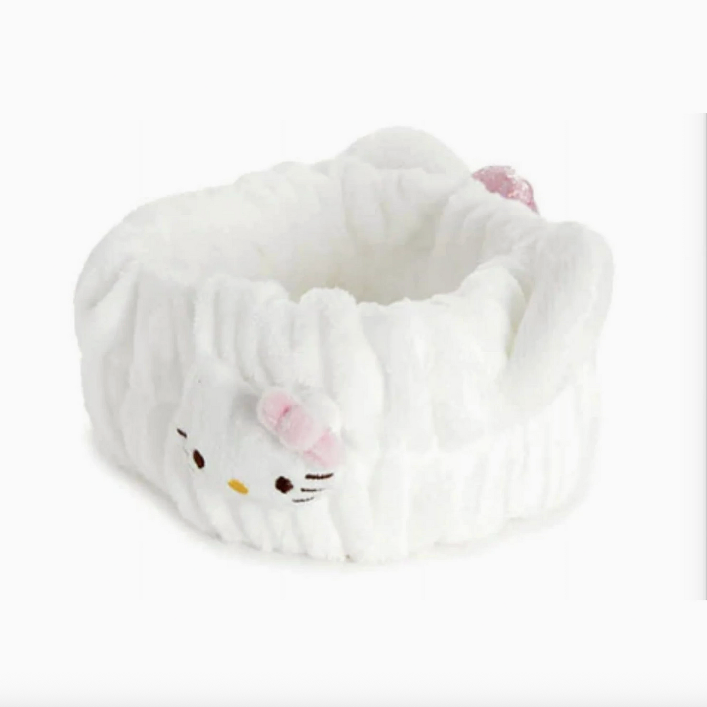 White plush slippers with a cat face design on a white background