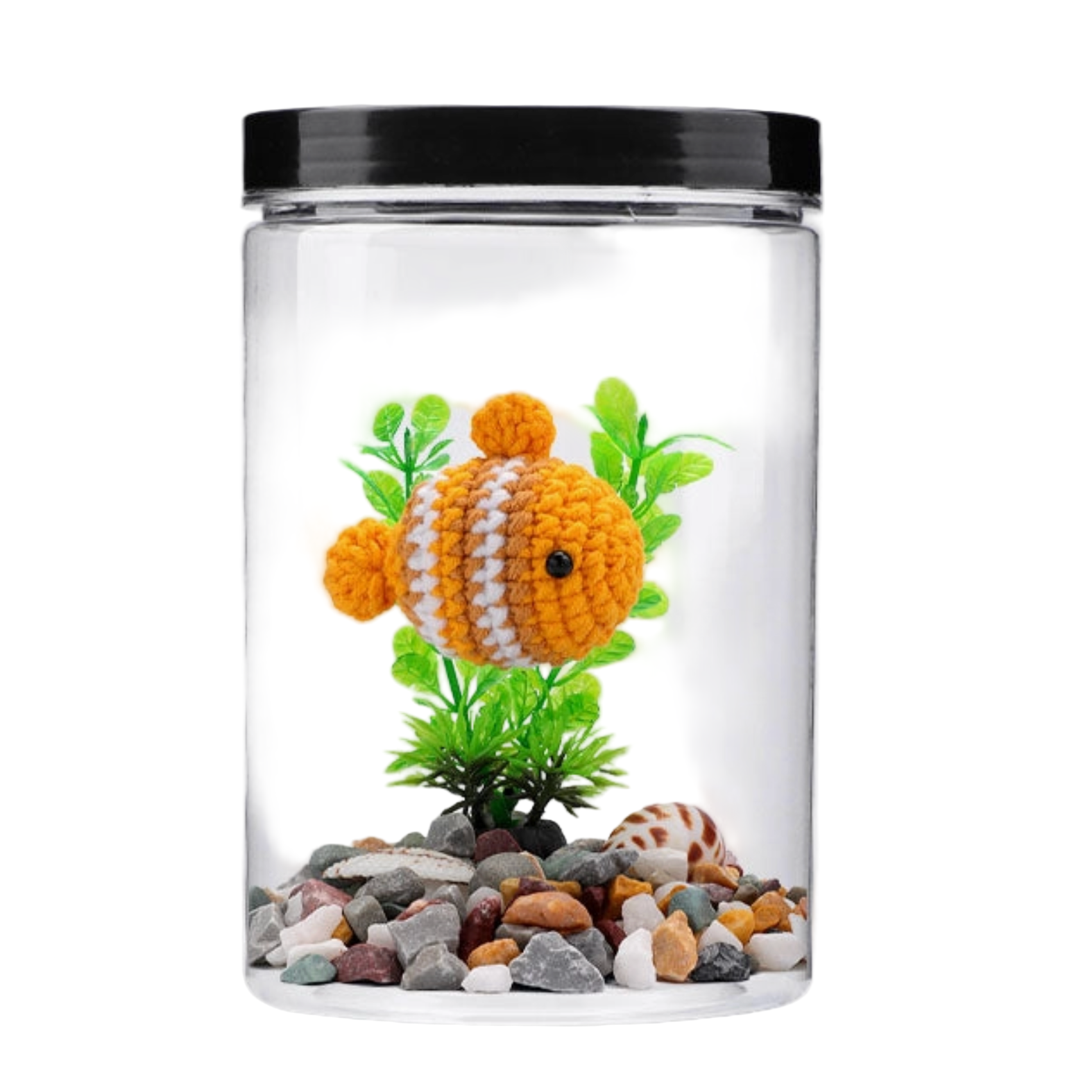 Small aquarium with a knitted goldfish, plants, and pebbles on a white background