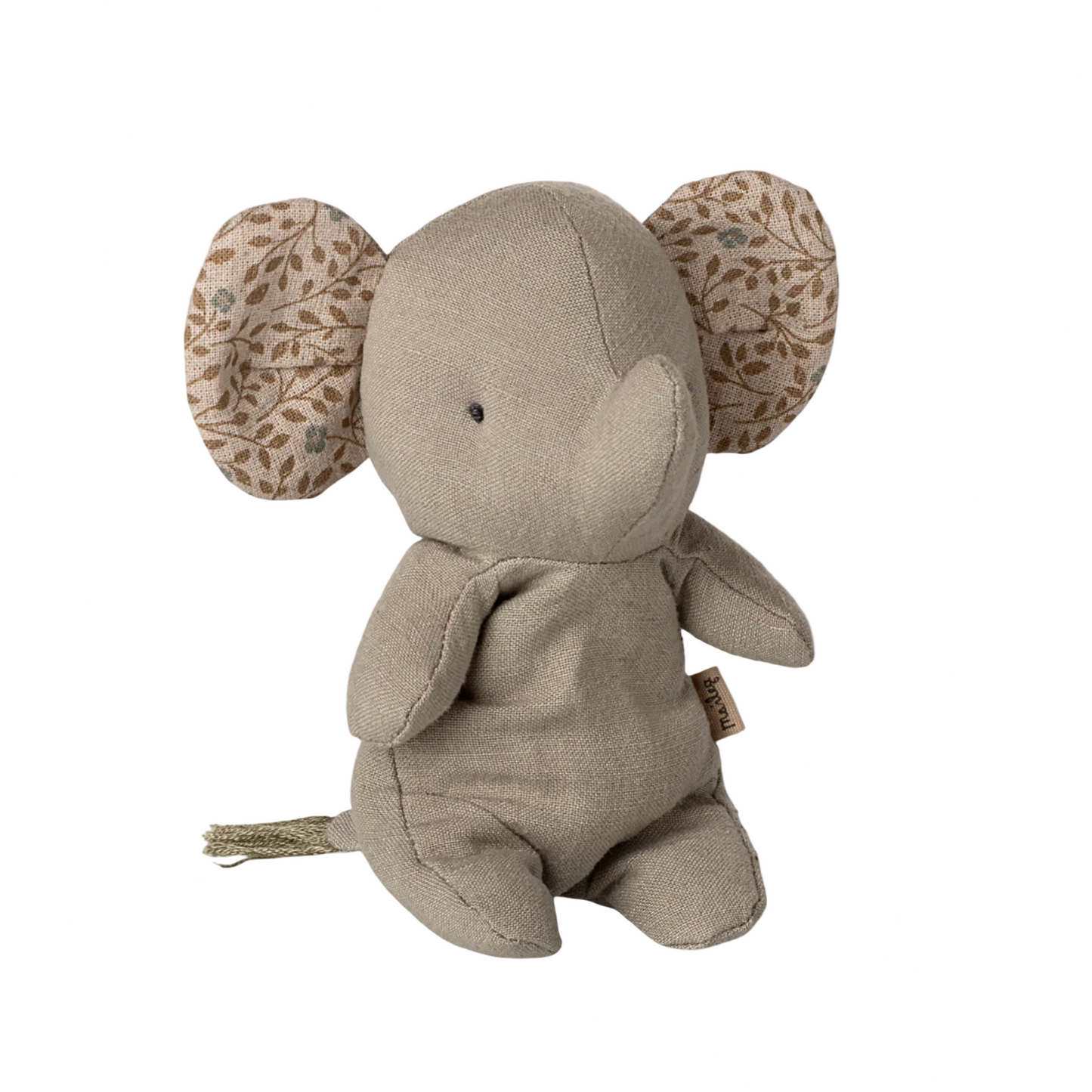 Small elephant plush toy with floral patterns on ears against a light background