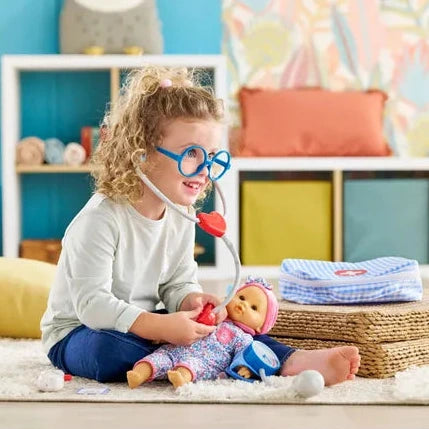 Child playing with a doll in a colorful room