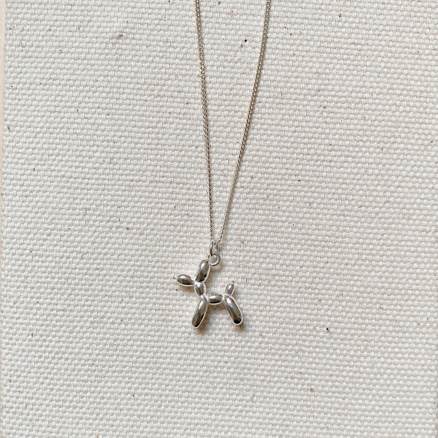 SILVER BALLON DOG NECKLACE